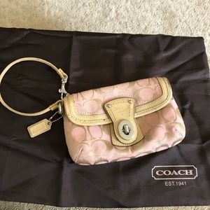 Pink coach wristlet